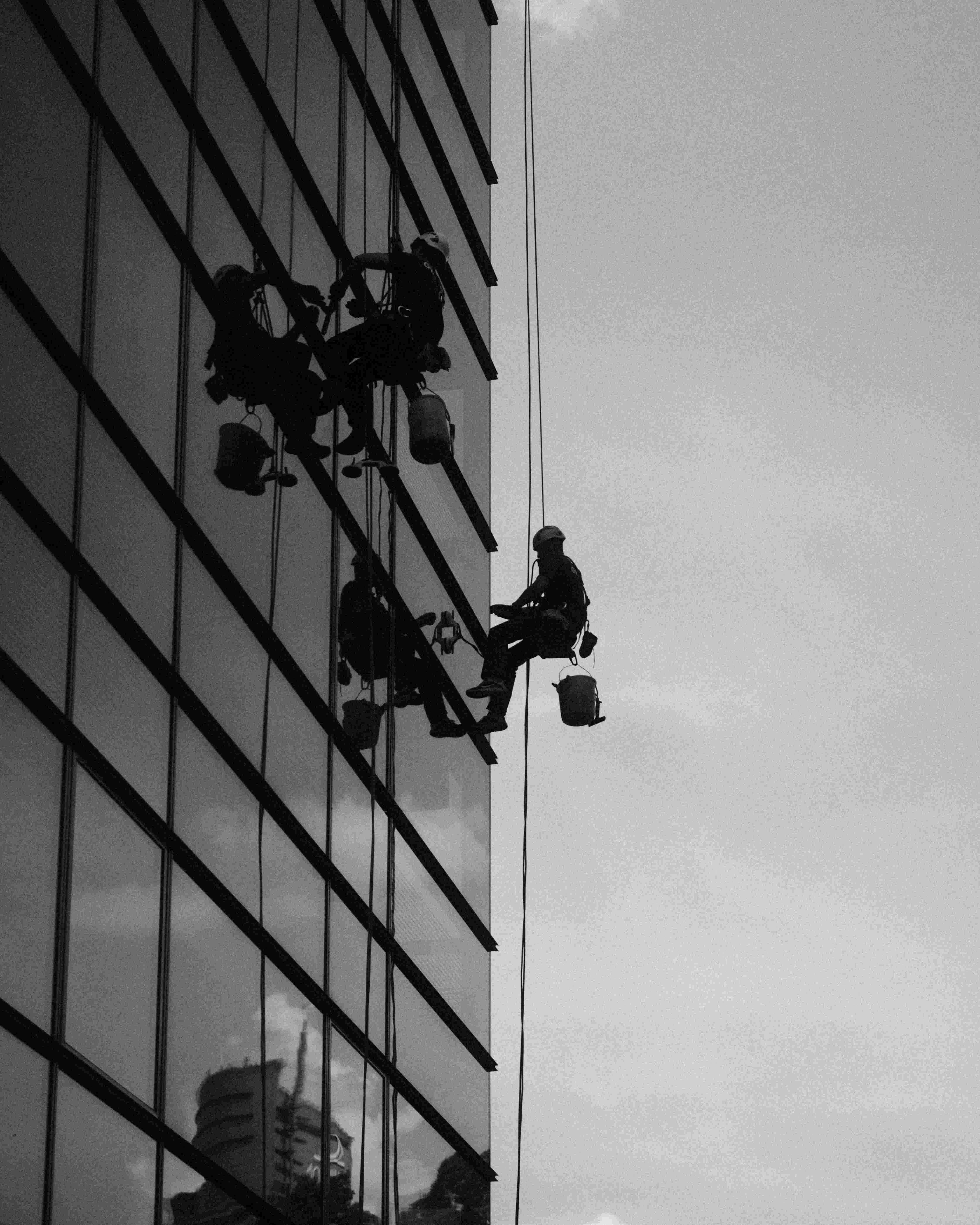 Abseiler on high-rise building facade